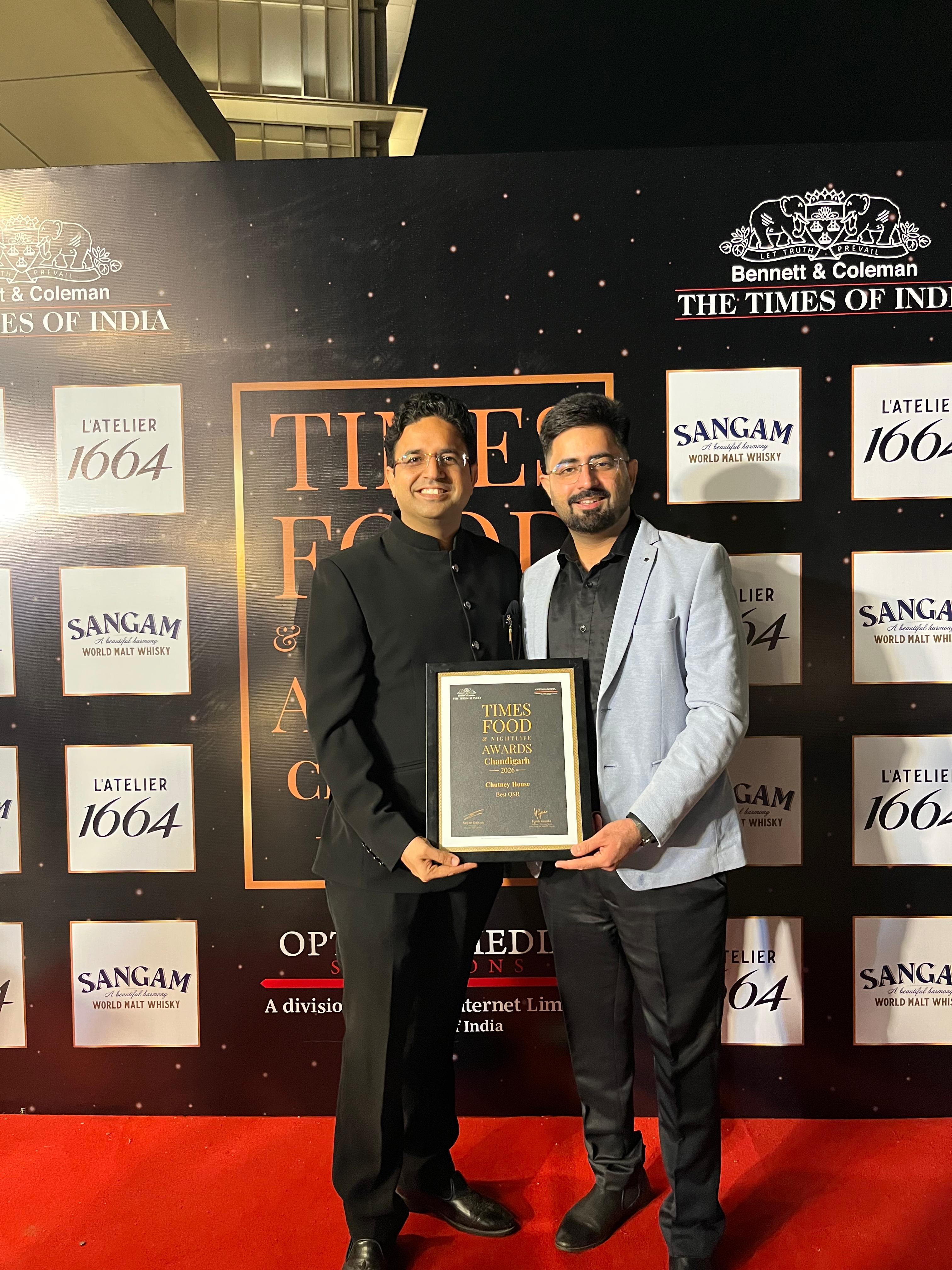 Chutney House team receiving Times Food and Nightlife award