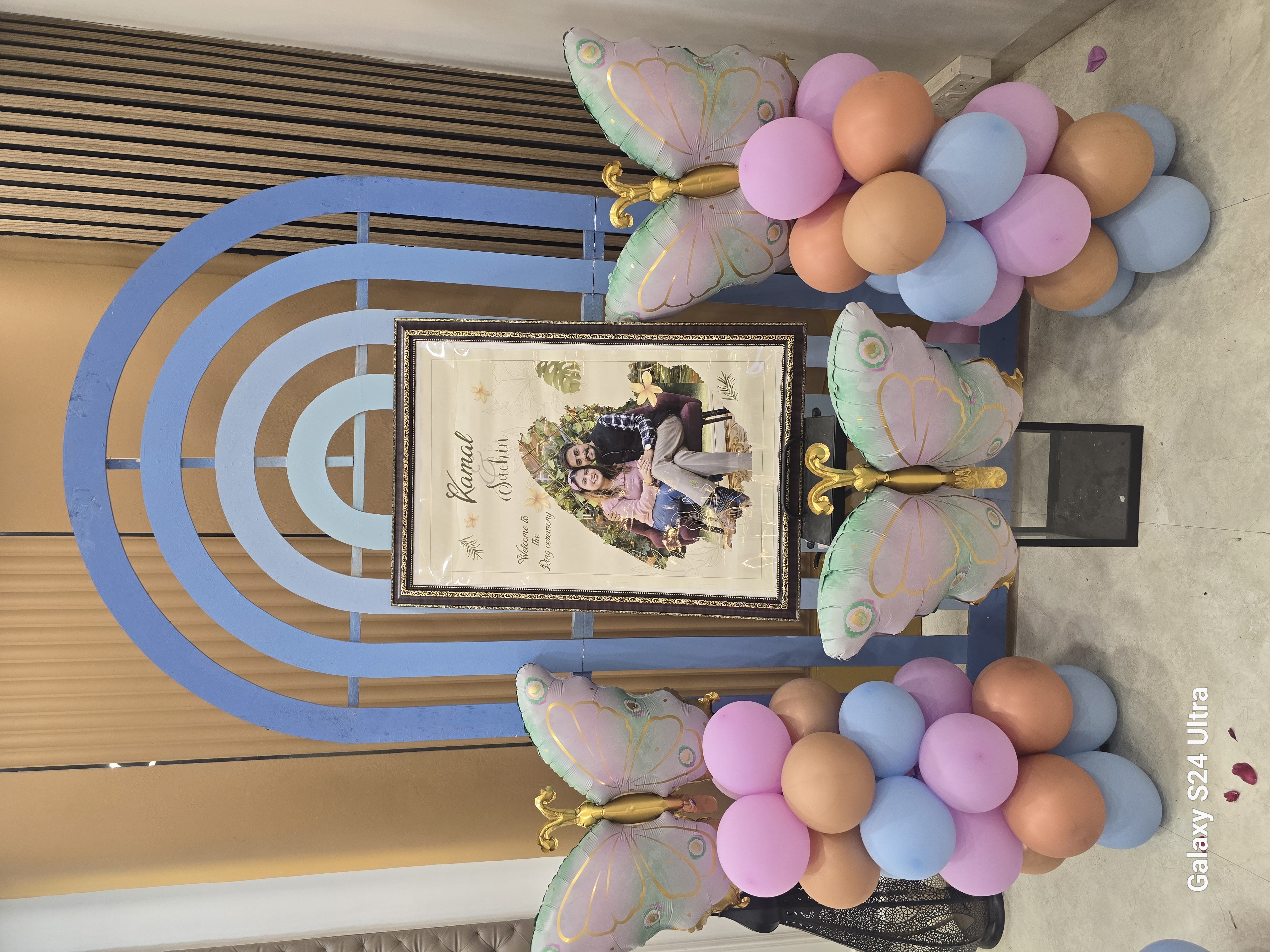 Roka and ring ceremony welcome decor with balloons and couple portrait